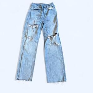 Light wash distressed denim jeans